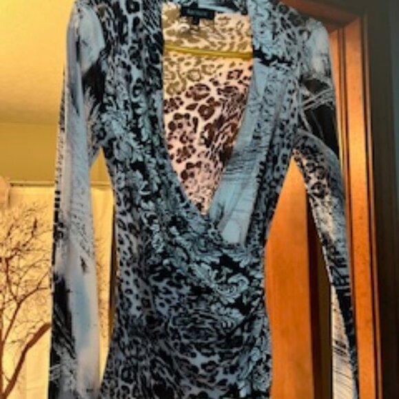 Office to evening pull on style top with side gathering. - Picture 1 of 4